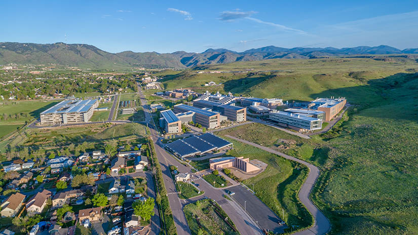 Aerial photo of NREL's South Table Mountain campus buildings and surrounding community