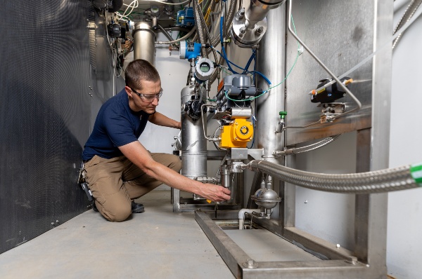 person working on equipment