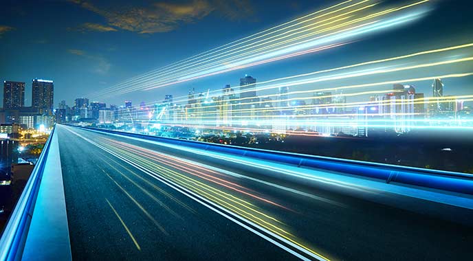 Long exposure of freeway at night showing light streams..