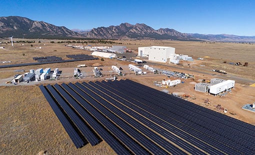 Aerial view of Flatirons campus with solar panels and storage facility