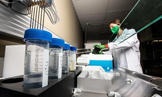 NREL researcher Emma Raszmann works in the Energy Storage Lab.