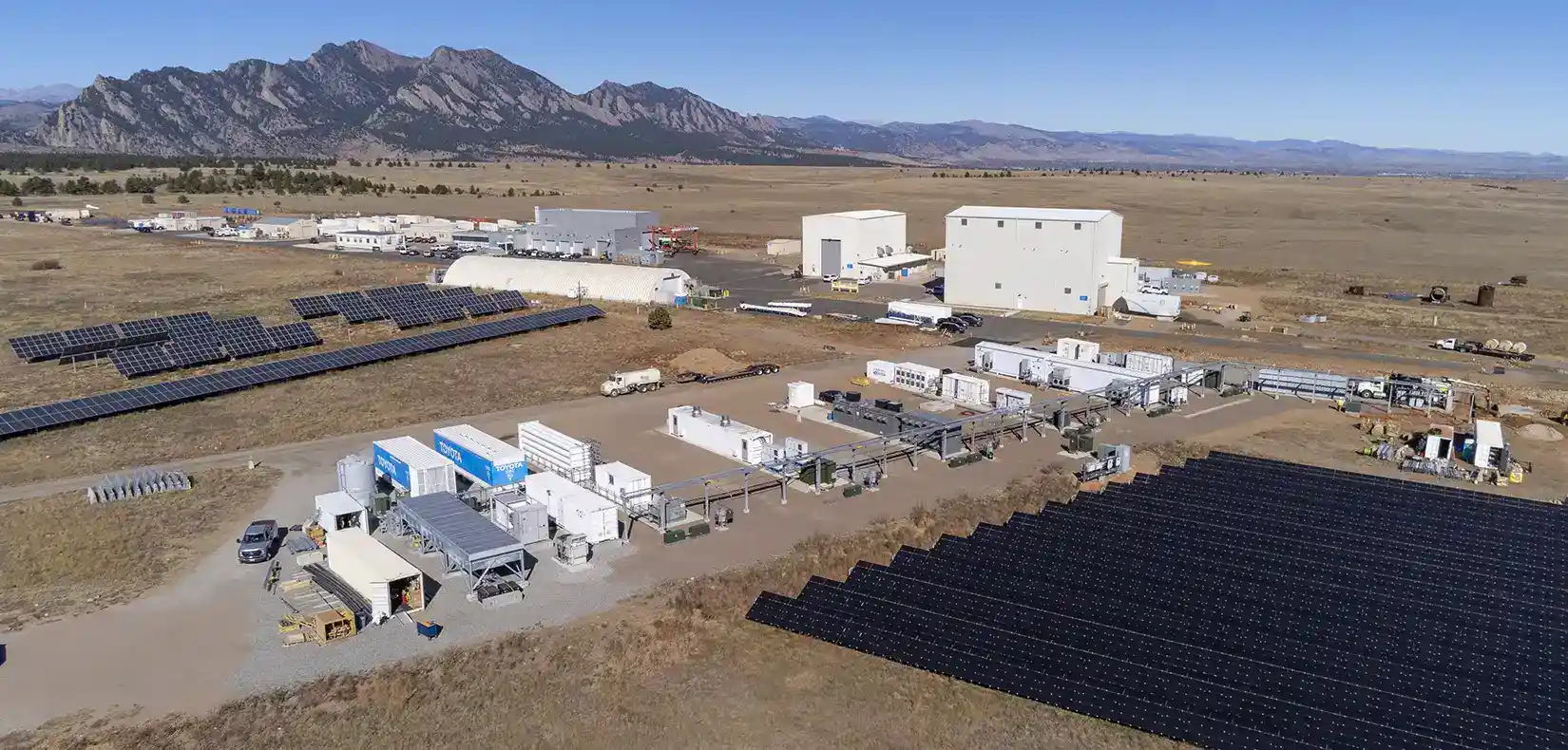 cybersecurity-at-scale-security-evaluation Aerial view of NREL's campus with energy storage buildings and solar arrays.