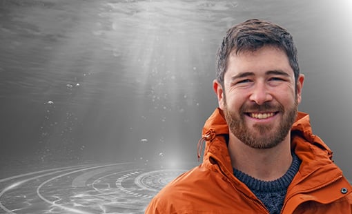 Patrick O'Byrne overlain on a black-and-white photo underwater.