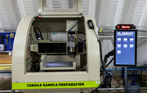 360tour-08-5451 A beige plastic container is open on the curved front to reveal mechanisms within. A touch screen is off to the side reading