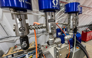 360tour-09-5406 Metal valves and tubes are all interlinked with hoses and wires.