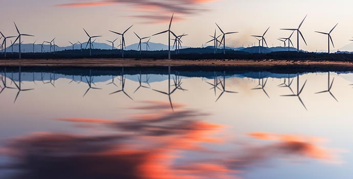 A wind farm at sunset