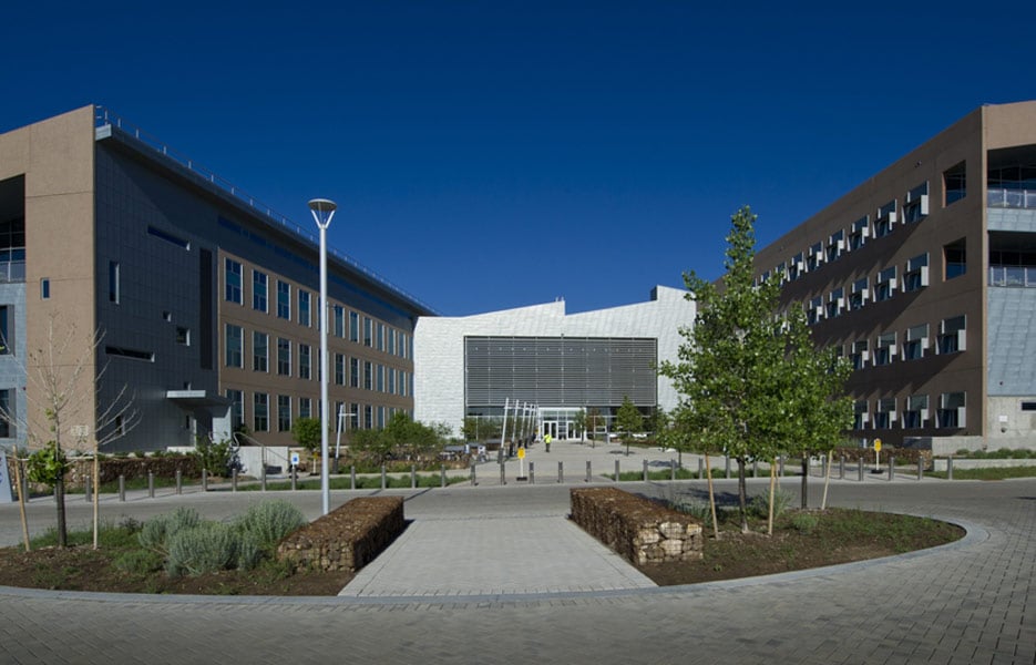 Entryway view of a building with two wings.