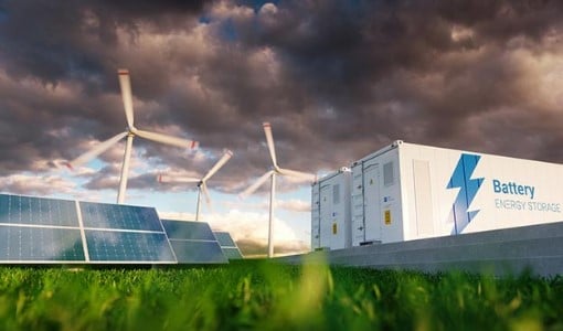 An illustration of solar panels, wind turbines, and stationary batteries sitting together on a field.