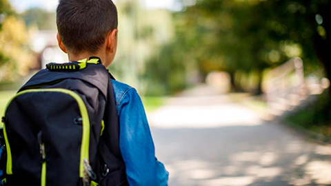 Kid Walking to School