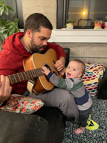 Cory Frontin playing the guitar