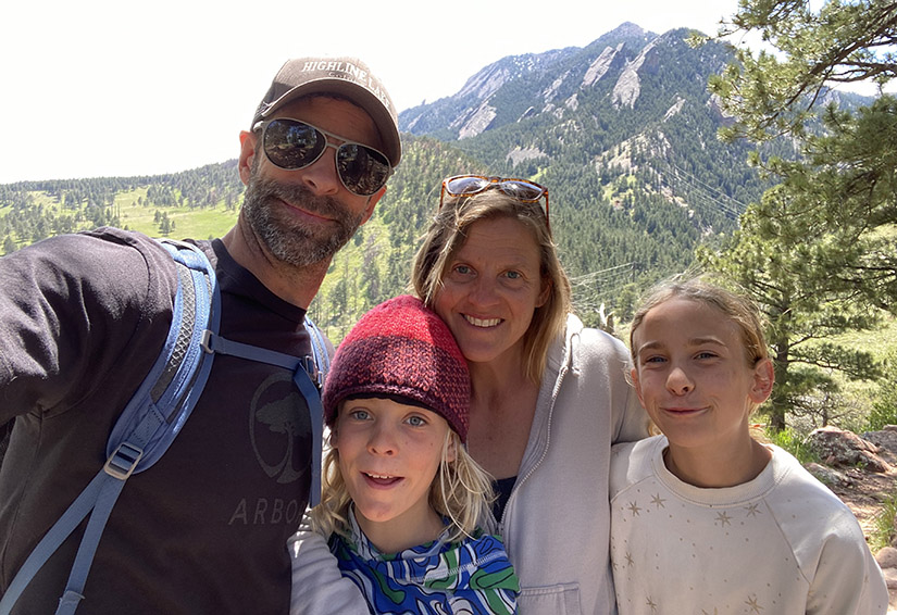 Greg Martin snaps a selfie with his wife and twins while on a hike.