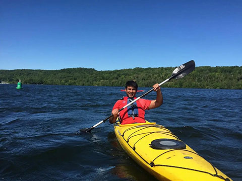 Salman Husain paddles a kayak