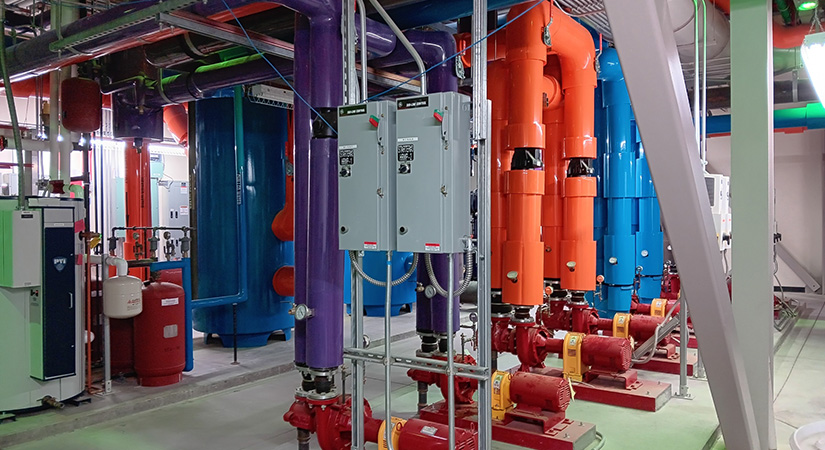 Colorful pipes in an industrial building.