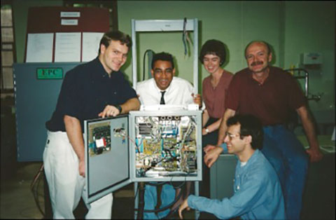 Group of people working on a motor drive