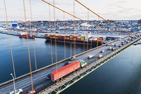 Vehicles driving on a water bridge.