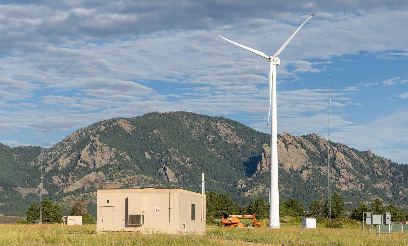 Wind turbine and data shed.